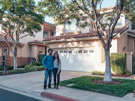 happy couple in front of their tiny house